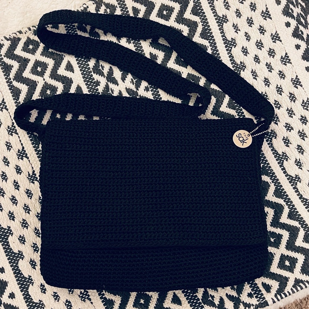 The Sak flap front knit hand bag black